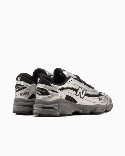 New Balance 1000 noir et argent métallique
